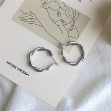 Load image into Gallery viewer, HUANZHI 2019 New Korean Simple S925  Weaving Twist Circle Hoop Temperamental Gold Metal Earrings for Women Girls
